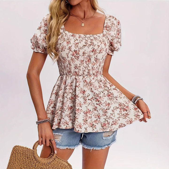 Dame blomsterprint bluse med puffærmer og rynket overdel Stilla