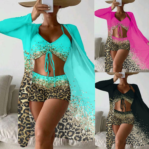 Dame strandoutfit med leopardmønster og farverigt cover-up Stilla