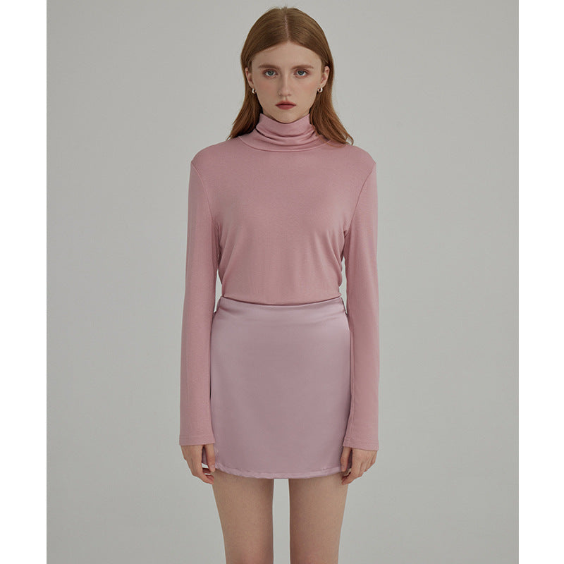Dame langærmet bluse med moderne høj krave og minimalistisk silhuet Stilla