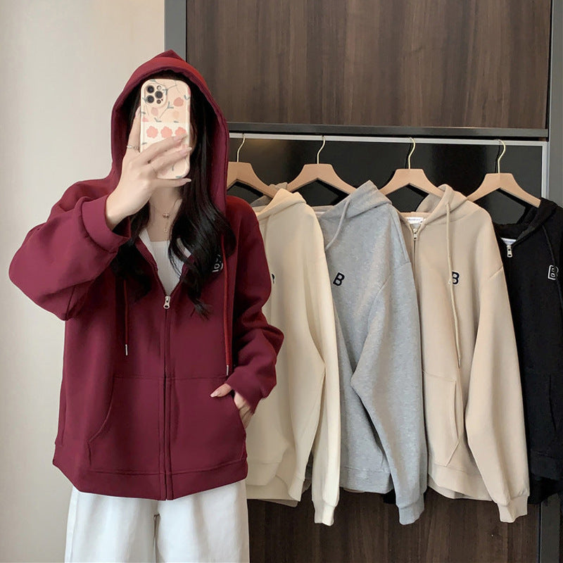 Dame Oversized Zip-Up Hoodie med kængurulommer og stilfuld brodering Stilla