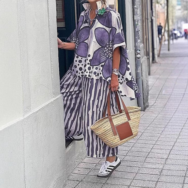 Dame fritidsbluse med moderne blomsterprint og afslappet snit Stilla