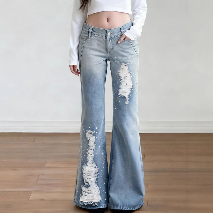 Dame Schlagjeans med moderigtige destroyed-detaljer og komfortabel pasform Skovae