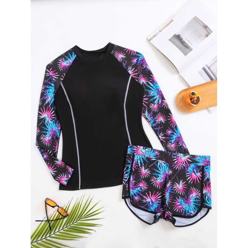 Dame Rashguard med sporty shorts og trendy blomsterdesign Skovae