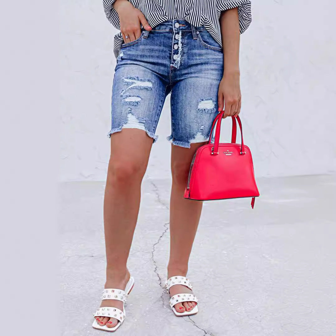 Dame jeansshorts med frynsede afslutninger og moderne destroyed-detaljer Stilla