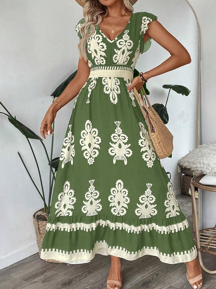 Dame maxikjole med V-hals og unikt blomsterdesign Stilla