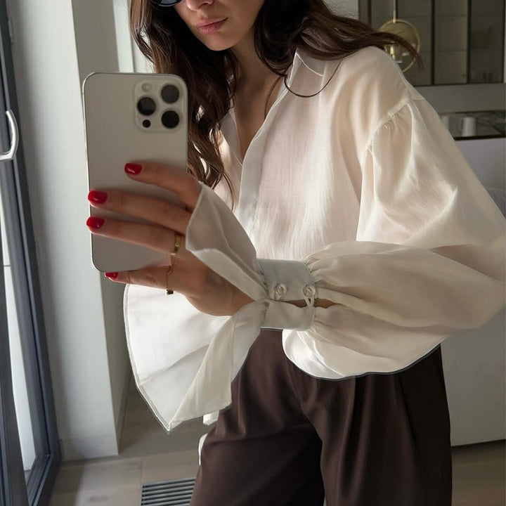 Dame Elegant Bluse med voluminøse Puffærmer og fint Strukturdesign Stilla