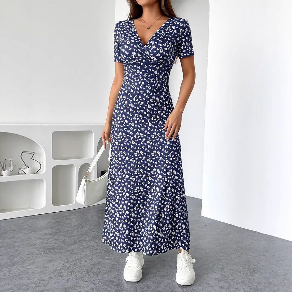 Dame Maxikjole med floral indpakningsdesign og praktiske sidelommer Stilla