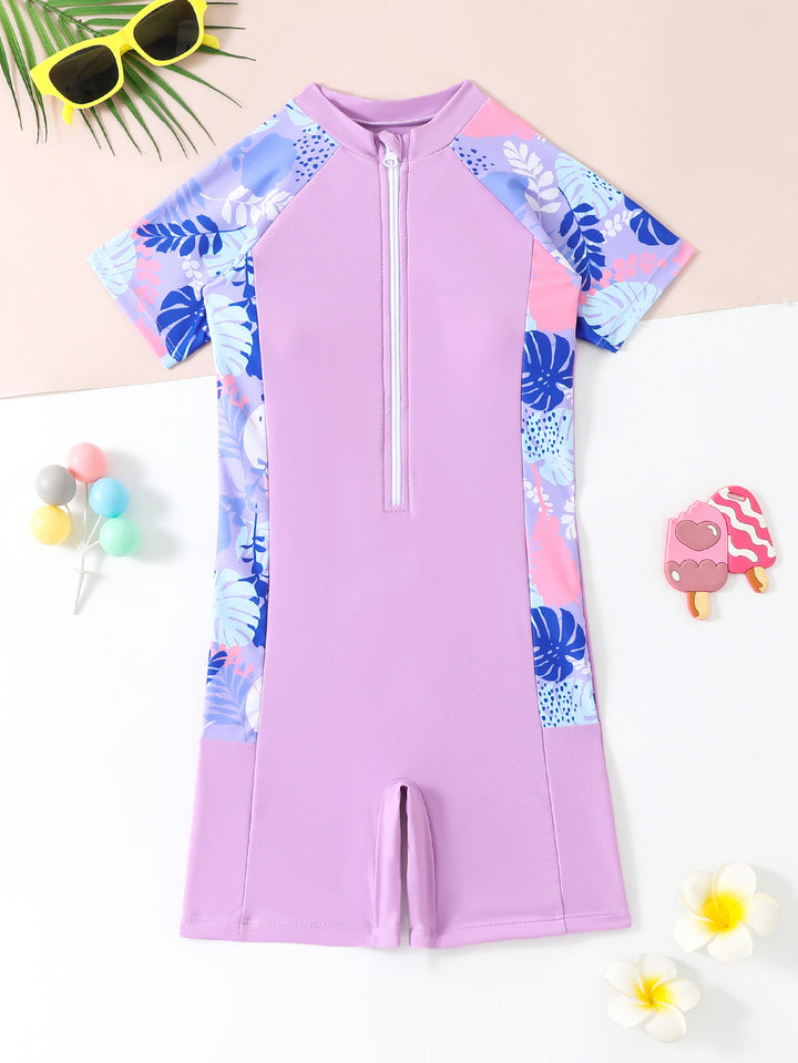 Dame én-delt surfdragt med blomsterdesign og kort snit Stilla