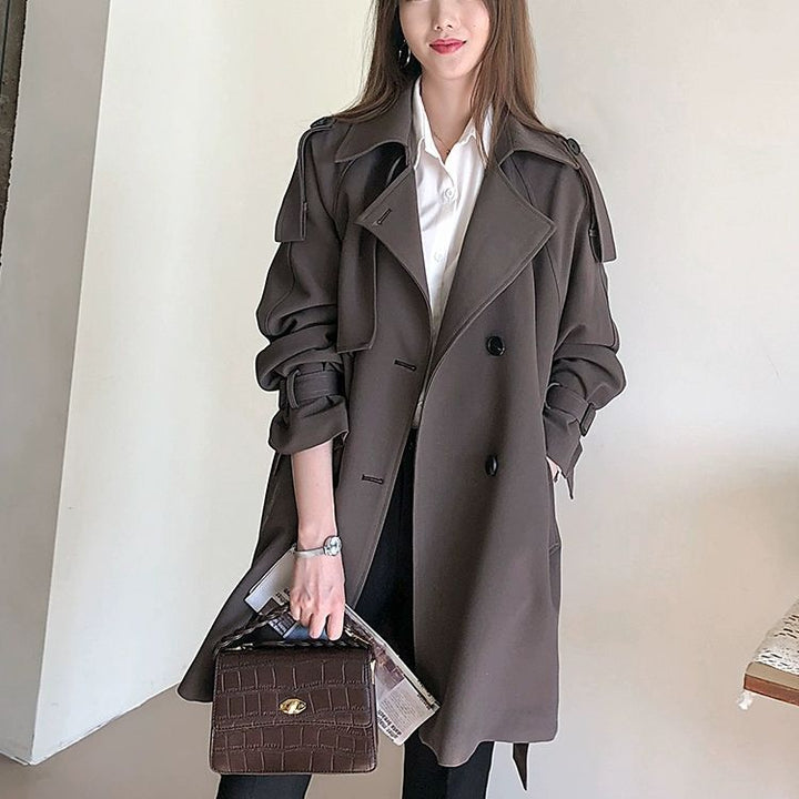 Dame mode trenchcoat med tekstureret design Stilla