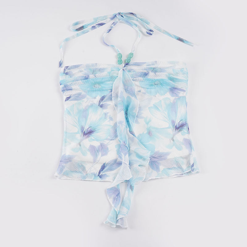 Dame halterneck bluse med blomsterdesign og raffineret krøllekant Skovae