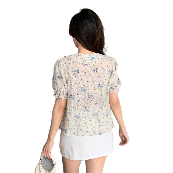 Damebluse med flæsekant og blomstermønster Stilla