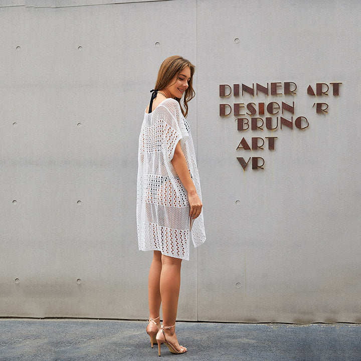 Dame Net-Strandponcho med elegant snit og luftigt design Stilla