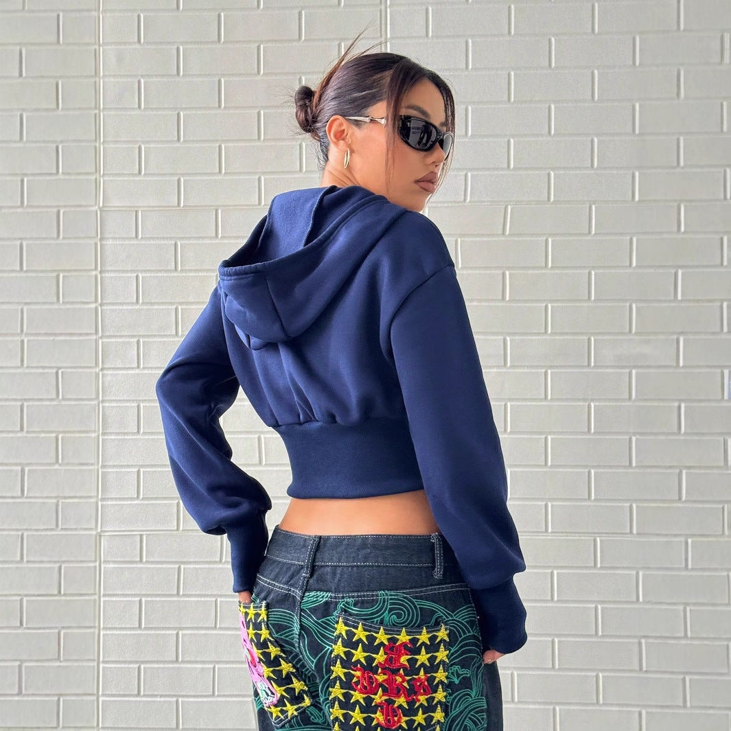 Kvinders cropped hoodie med lynlås og brede ærmer Stilla