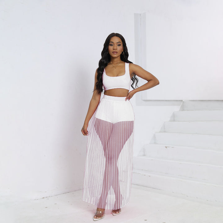 Dame loungewear-sæt med gennemsigtig maxi-nederdel og matchende top Stilla