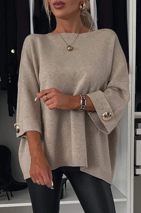 Dame elegant top med dekorative knapper og generøs pasform Stiila