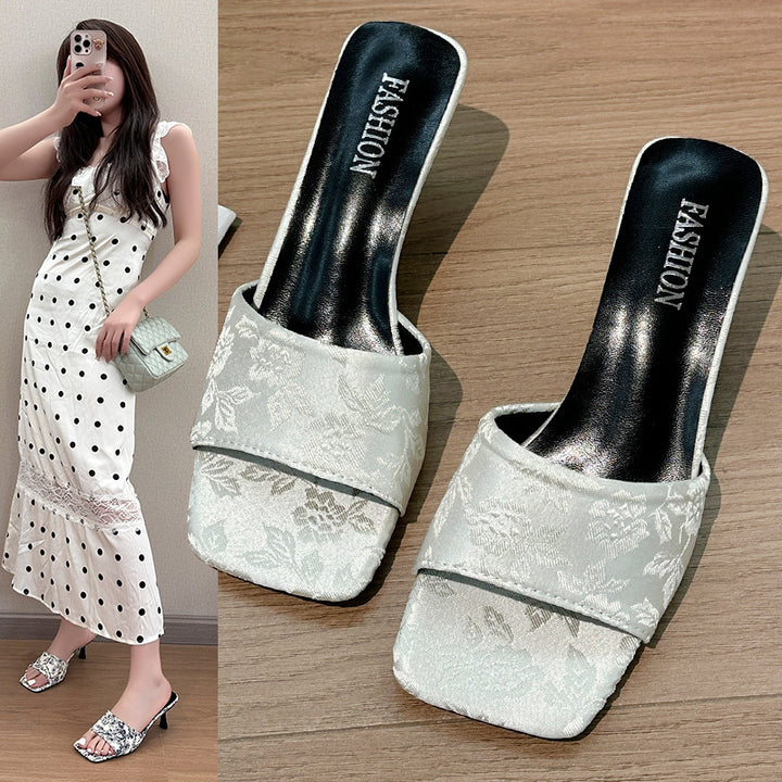 Damer Behagelige Slingback-Pantoletten med elegant blomstermønster og moderne hæl Stilla