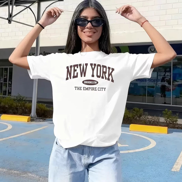 Dame afslappet oversized T-shirt med New York tekst Skovae