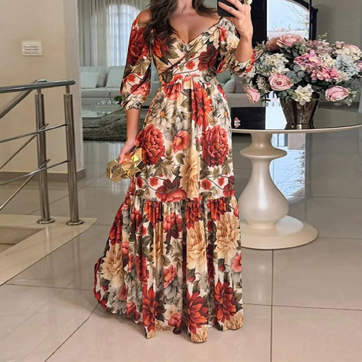 Kvinders blomster maxi kjole med off-shoulder design og flæse kant Stilla