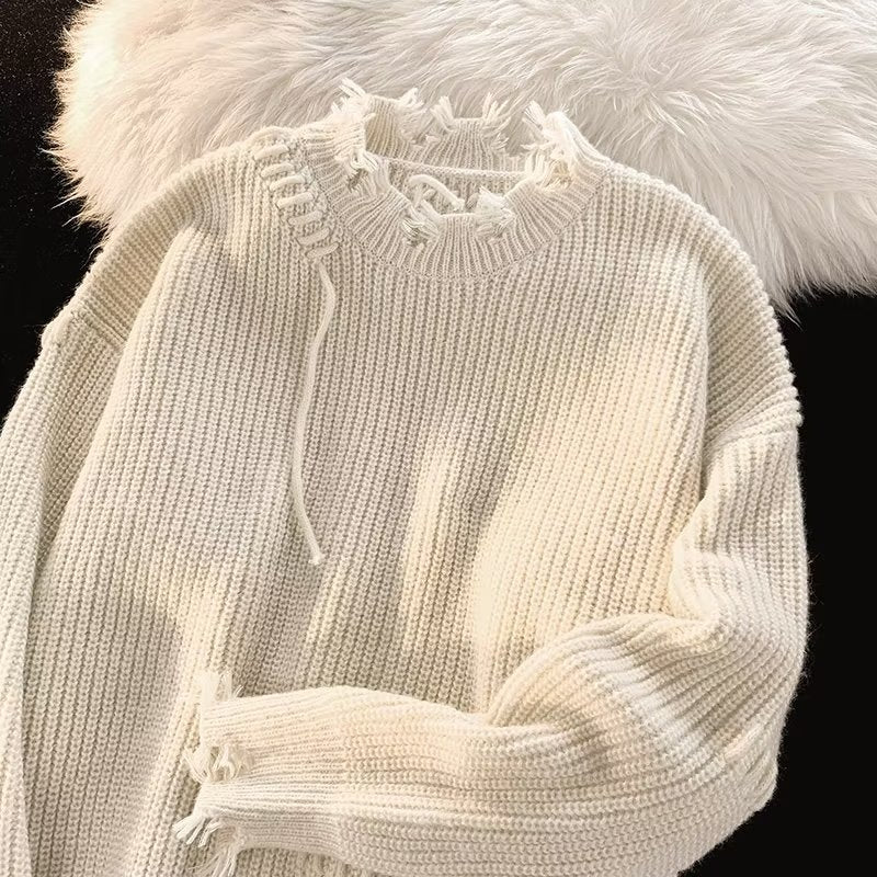 Dame Oversized Pullover med moderne frynser og unikke kontrastsyninger Stilla