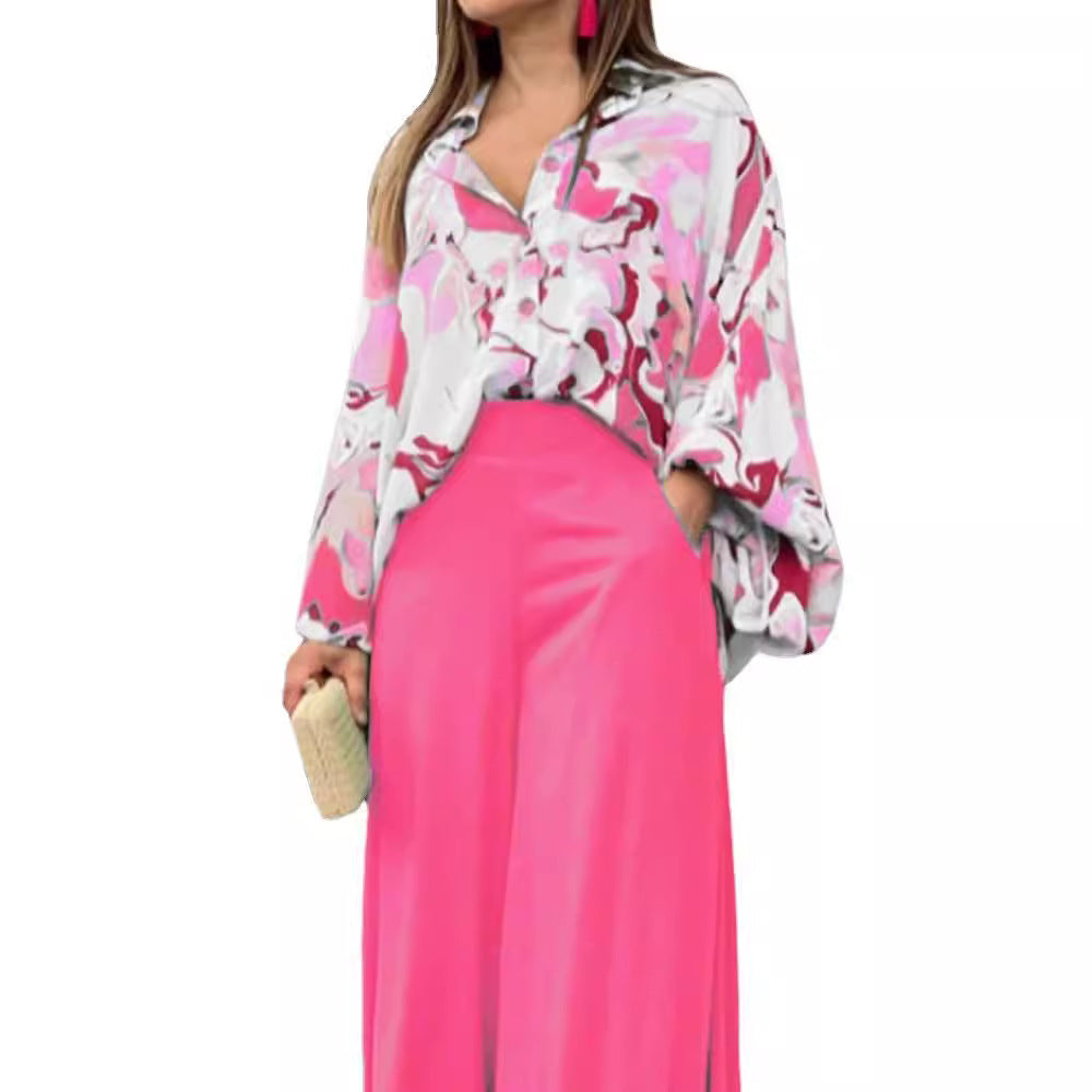 Dame fritidsbluse med farverig marmortryk og loose fit Stilla