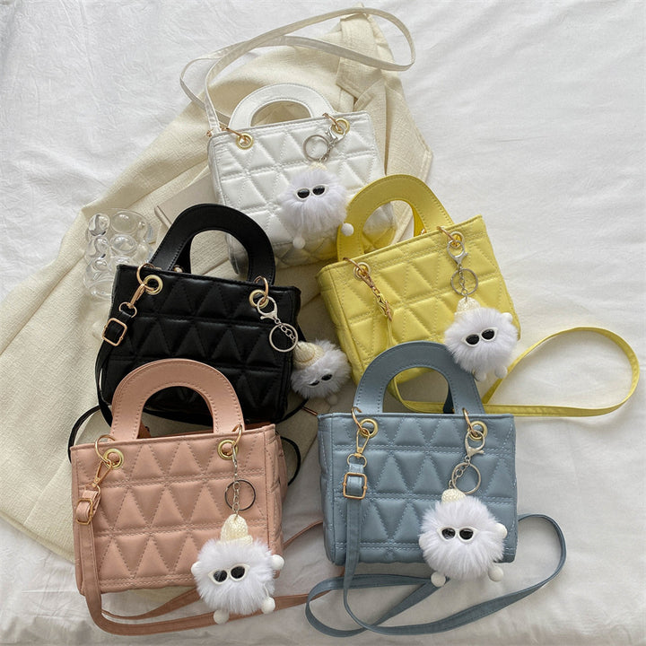Femme quilted håndtaske med aftagelig charme Stilla