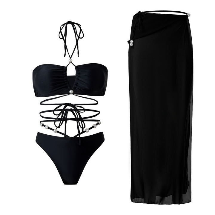 Dame bikini-sæt med raffinerede linjer og elegante perledetaljer Skovae