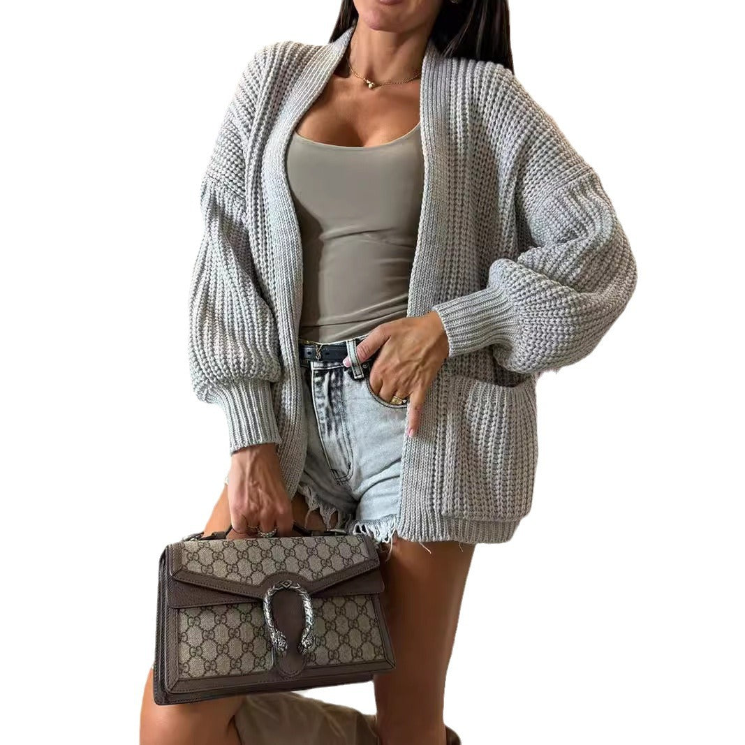 Kvindernes moderne cardigan med voluminøse ærmer og lommer Stilla