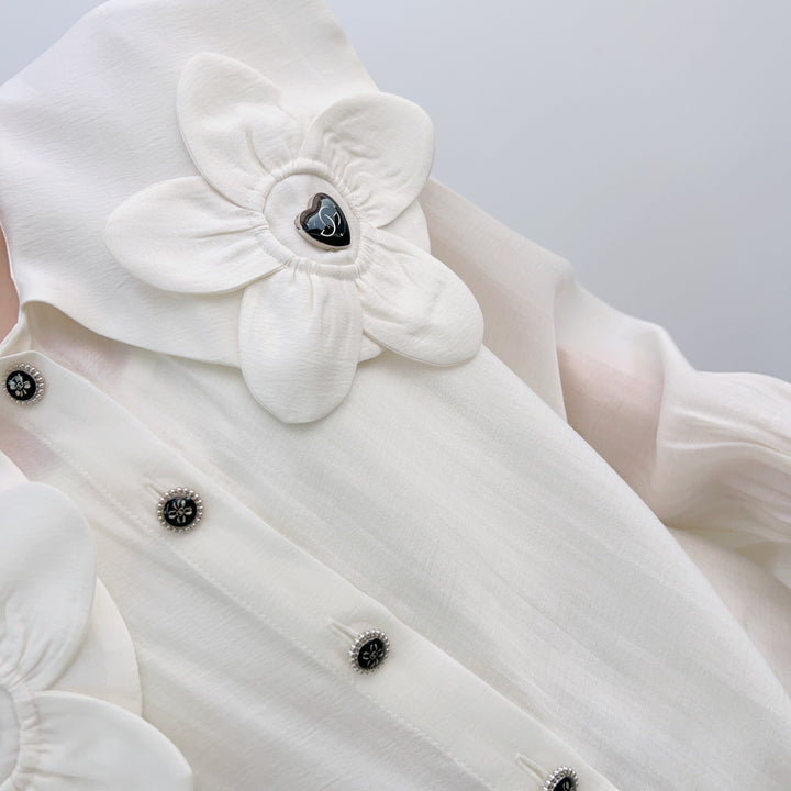 Dame elegant bluse med blomsterapplikationer og puffærmer Stilla