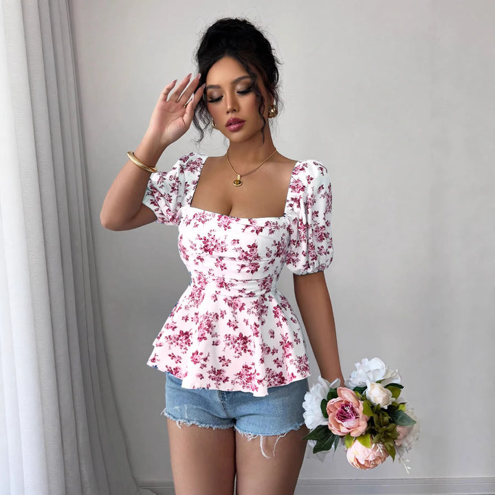 Dame Peplum-bluse med puffærmer og blomsterdesign Skovae