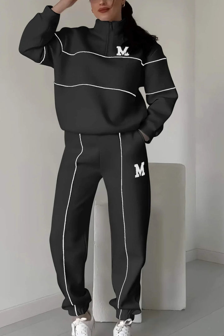 Kvinders sporty loungewear-sæt med halv lynlås og elastisk talje Stilla