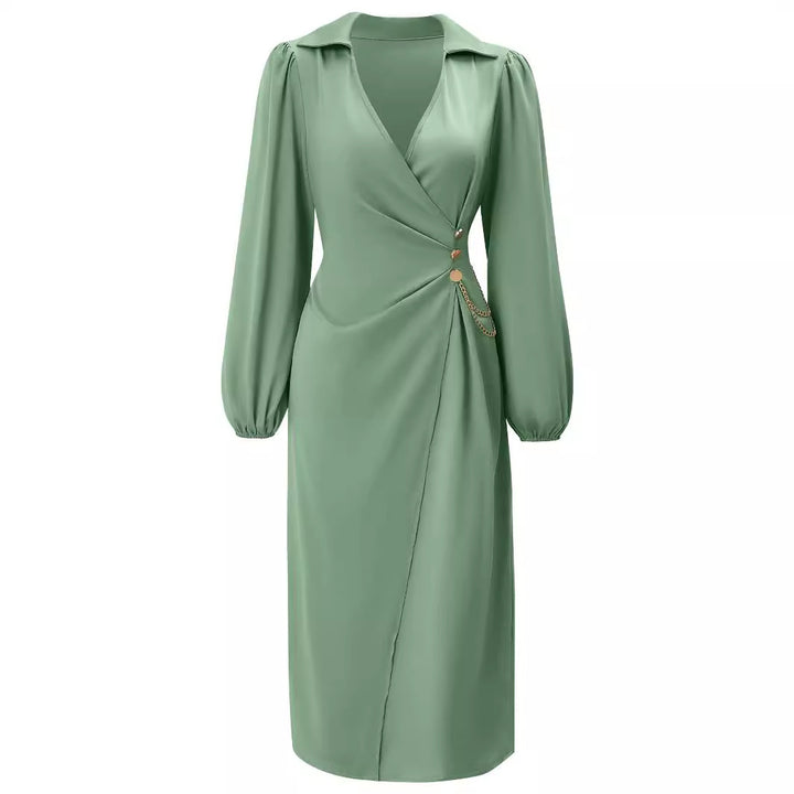 Dame elegant vikledress med flydende stof og markante puffærmer Stilla