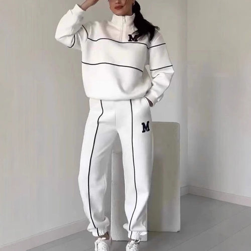 Kvinders sporty loungewear-sæt med halv lynlås og elastisk talje Stilla