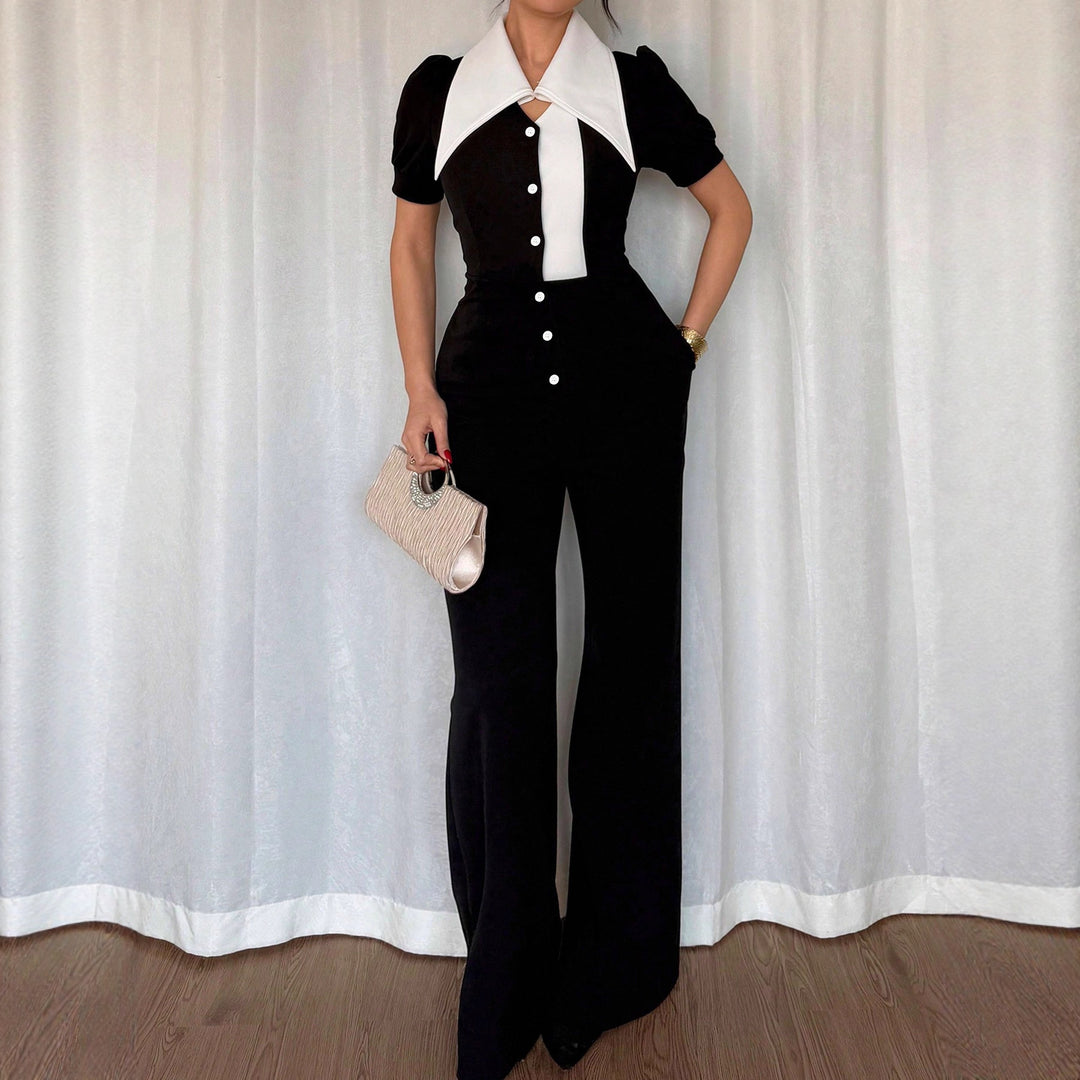 Dame jumpsuit med elegant krave og tætsiddende snit Skovae
