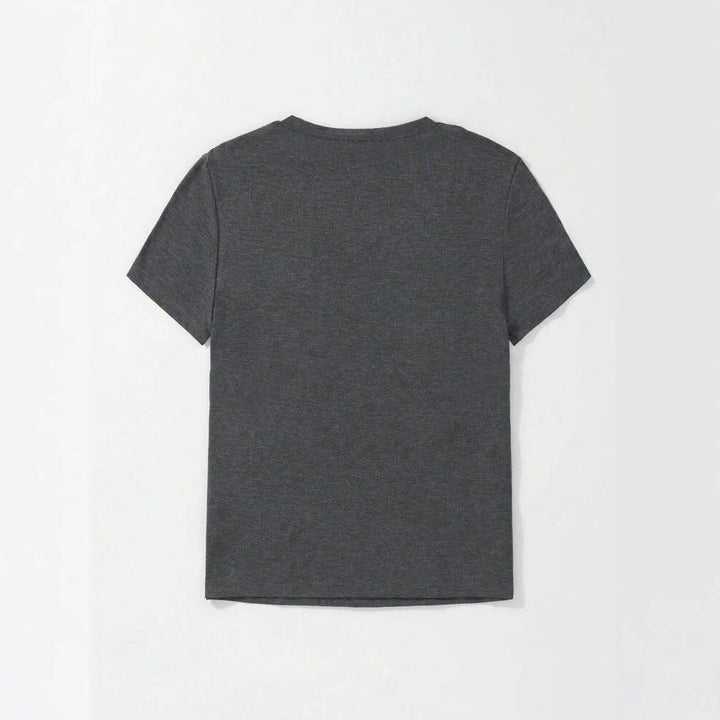 Dame T-shirt med floralt motiv og inspirerende tekst Stilla