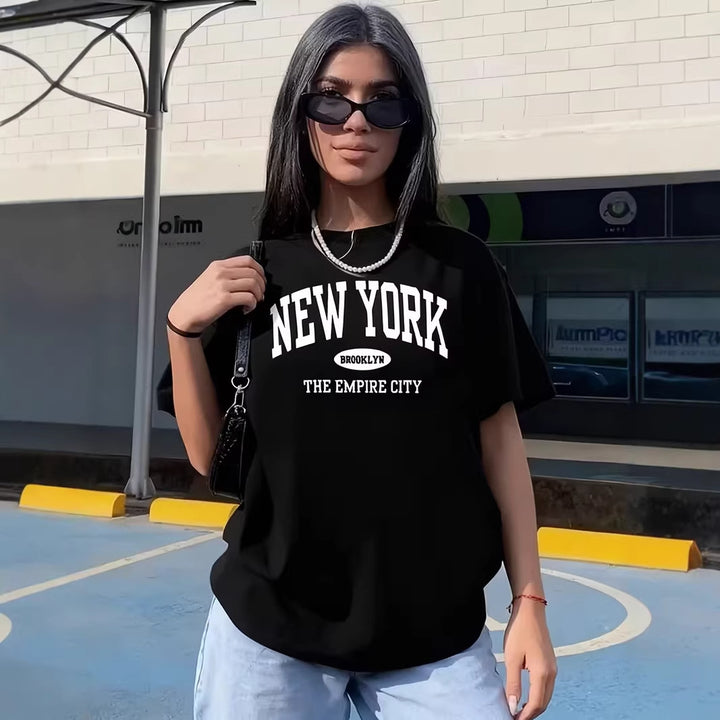 Dame afslappet oversized T-shirt med New York tekst Skovae