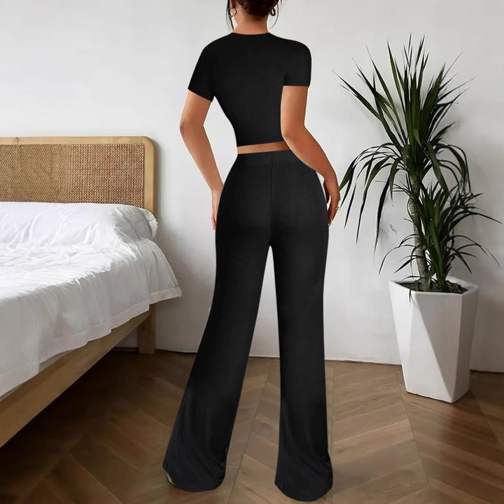 Dame Lækkert koordinatsæt med cropped top og løstsiddende bukser Stilla