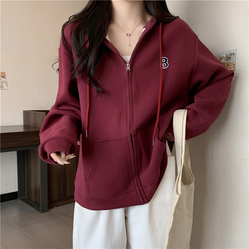 Femme Cozy Zip-Up Hættetrøje med funktionelle Kængurulommer Stilla