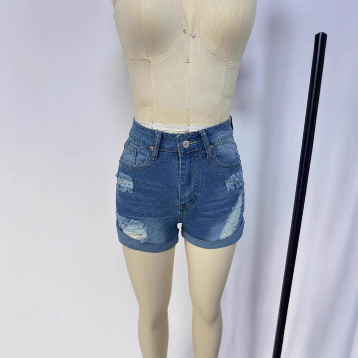 Dame korte Destroyed Denim-shorts i afslappet look med opsmøgede masker og stilfulde revnedetaljer Skovae