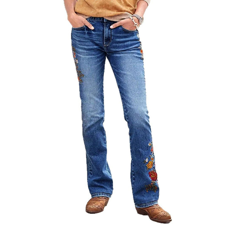 Damejeans med blomsterbroderier og vidde ben Stilla