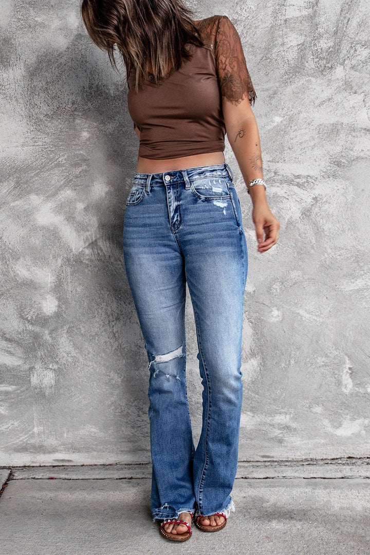 Dame brede flared jeans med moderigtige destroyed-look og høj talje Stilla