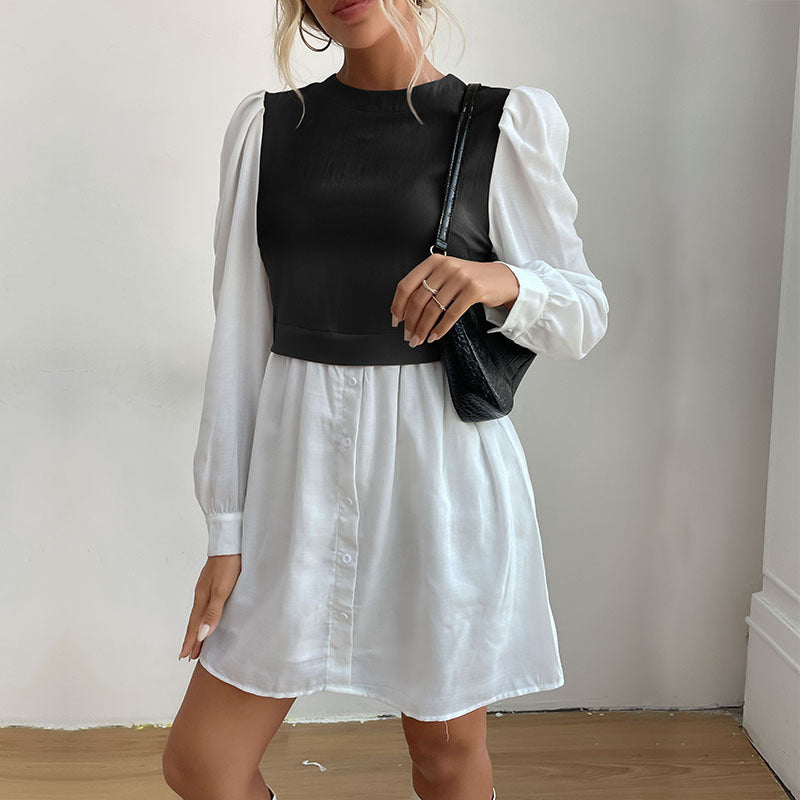 Dame mode skjortekjole med elegante puffærmer og knapbar front Stilla