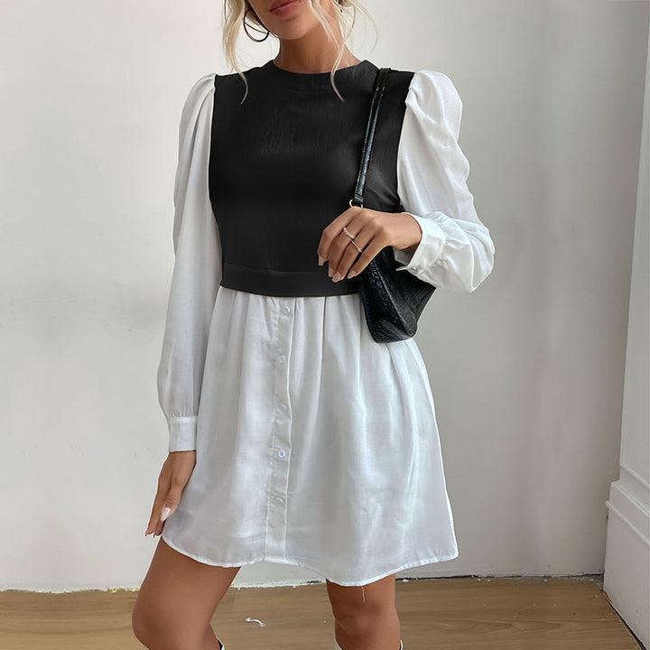 Dame mode skjortekjole med elegante puffærmer og knapbar front Stilla