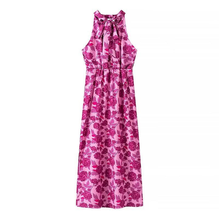 Dame maxikjole med floral trykdesign og elegant split Stilla