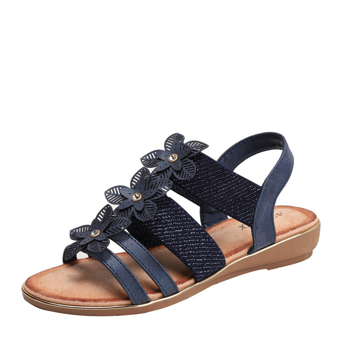 Dame sandaler med blomstret accent og justerbart remdesign Stilla