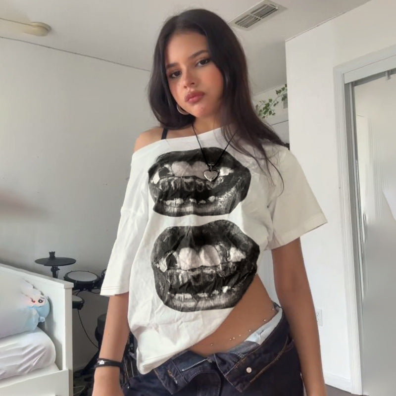 Dame T-shirt med glitrende korsdesign og afslappet pasform Skovae