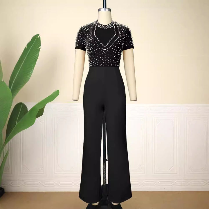 Dame elegant jumpsuit med glimrende perle detaljer Skovae