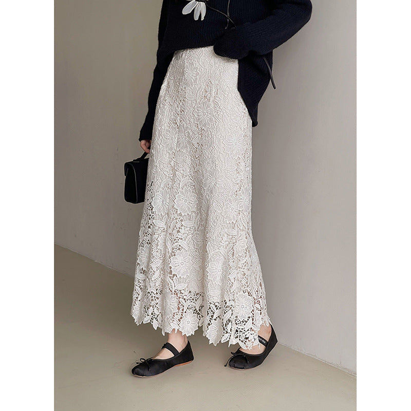 Dame spids maxiskørt med elegant blomsterdesign og transparente detaljer Stilla
