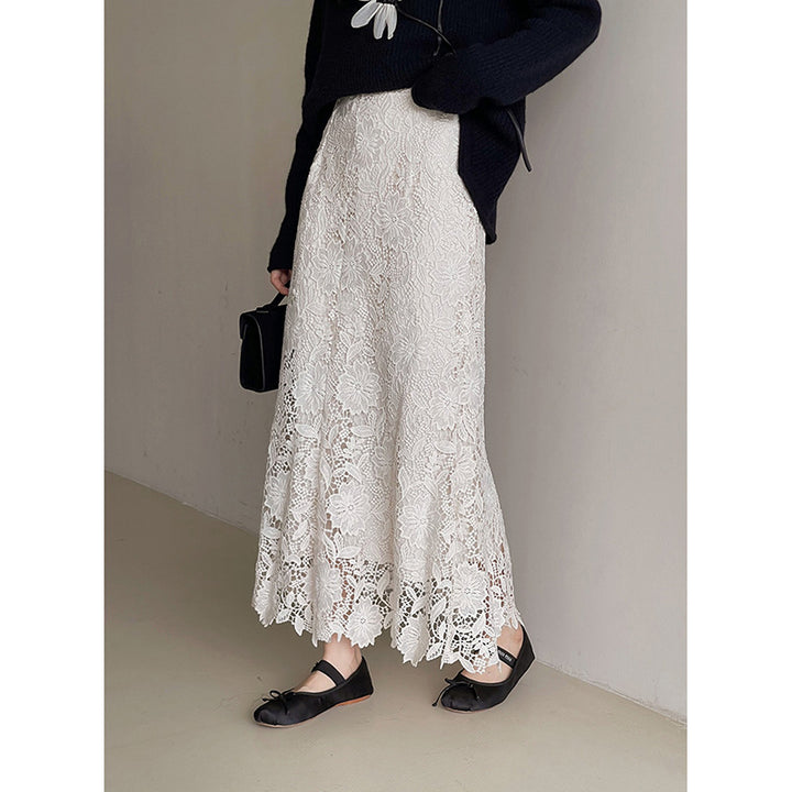 Dame spids maxiskørt med elegant blomsterdesign og transparente detaljer Stilla