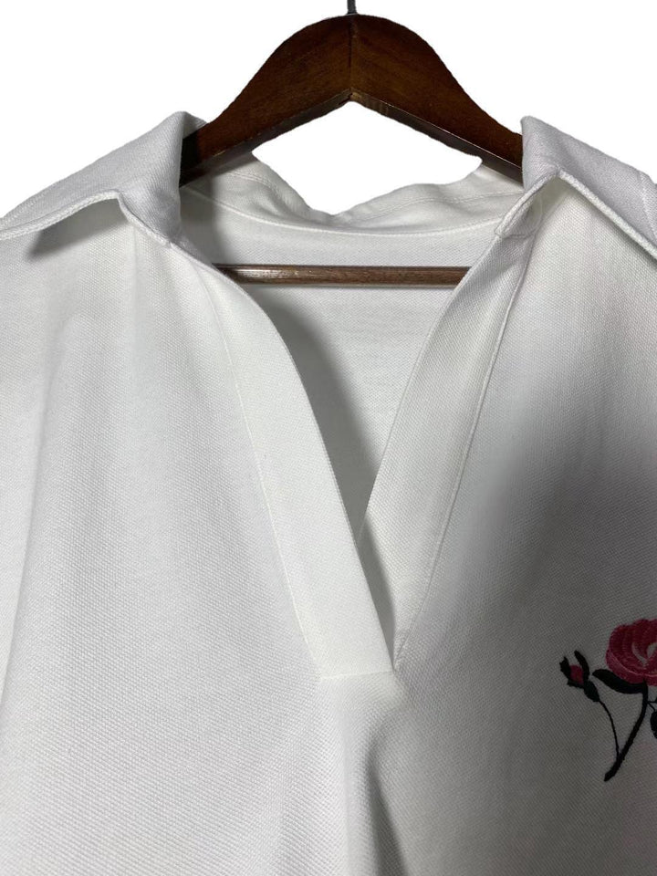 Dame polo T-shirt med blomster broderi Stilla