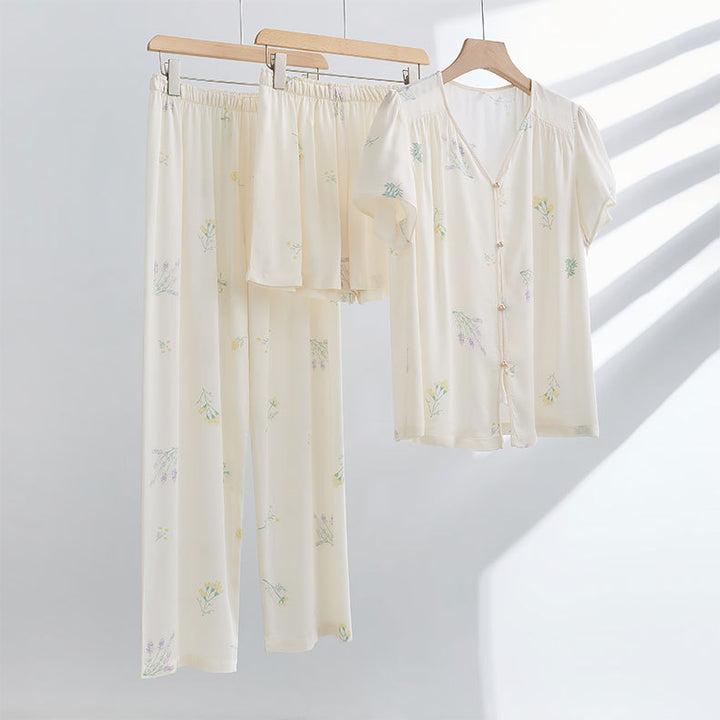 Dame åndbar pyjamas-sæt med blomstret design og elegant knapliste Stilla